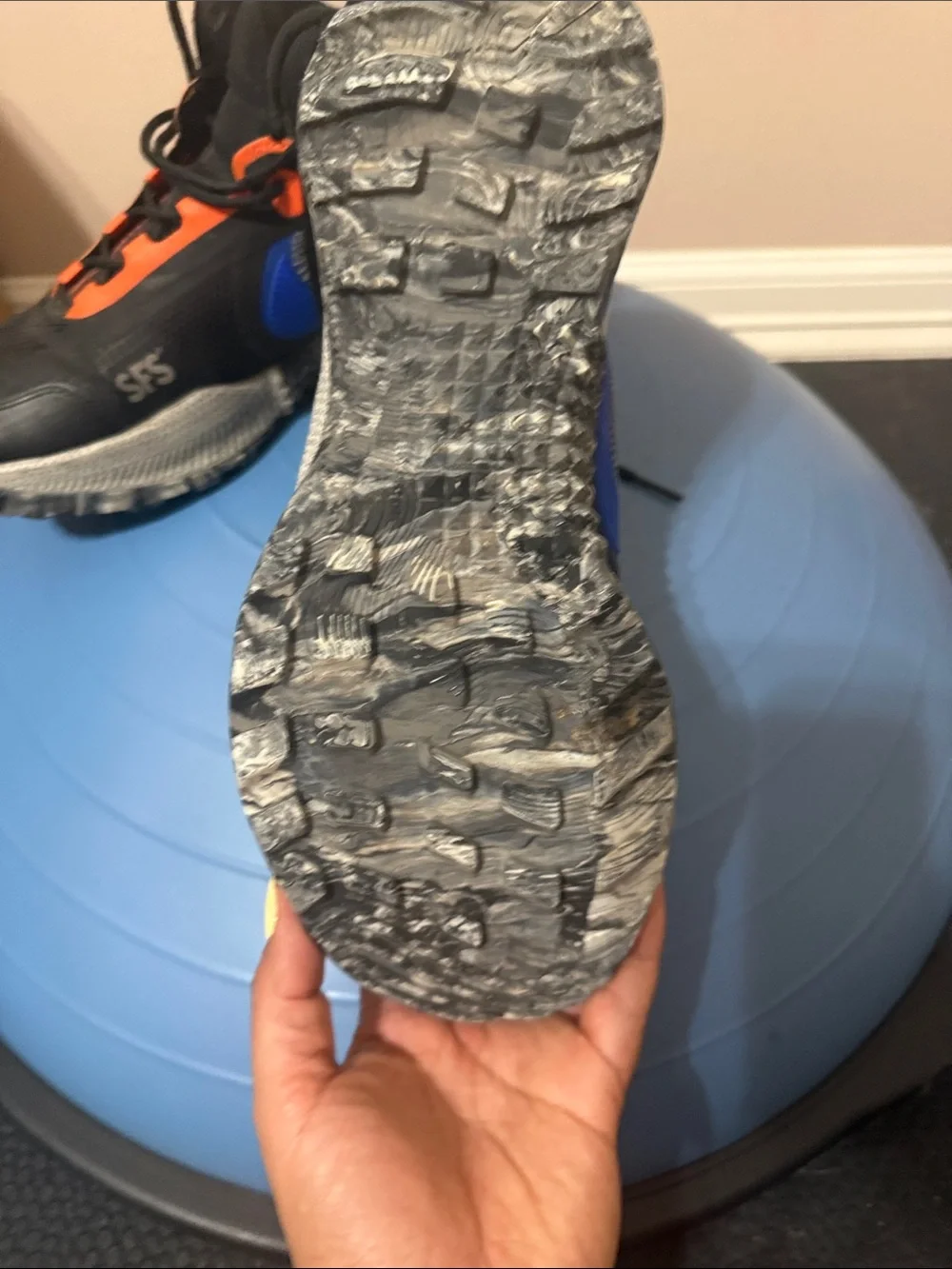 Nike Black Sneakers with Blue Swoosh and Orange Accents